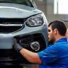 Certified Ford technician at work in Camilla service bay